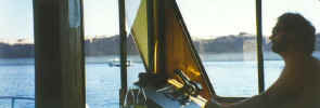 Ed piloting the houseboat on Lake Powell.