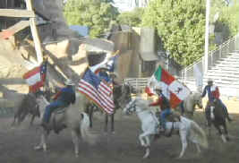 Cowboys riding with the Six Flags Over Texas