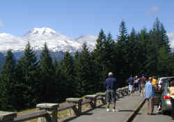 Visitors stopping at a Mount Rainier viewpoint, coming in from the east.