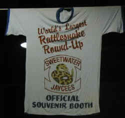 A huge t-shirt advertising the World's Biggest Rattlesnake Roundup.