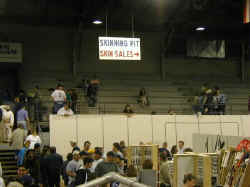 A sign overhead pointing to the Skinning Pit and Skin Sales.